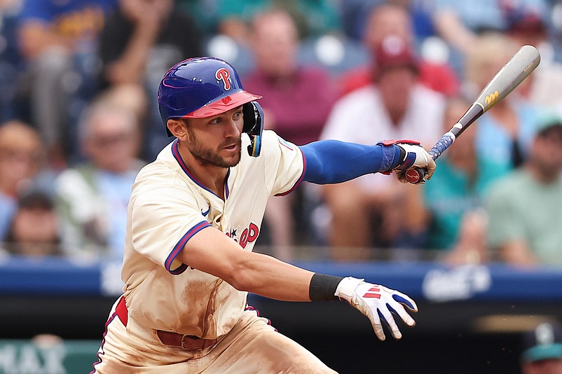 Aug 20, 2025; Philadelphia, Pennsylvania, USA; Philadelphia Phillies shortstop Trea Turner (7) hits an RBI single during the seventh inning against the Seattle Mariners at Citizens Bank Park. Mandatory Credit: Bill Streicher-Imagn Images