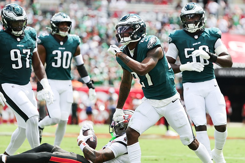 Sep 28, 2025; Tampa, Florida, USA; Philadelphia Eagles safety Sydney Brown (21) celebrates during the first quarter against the Tampa Bay Buccaneers at Raymond James Stadium. Mandatory Credit: Kim Klement Neitzel-Imagn Images