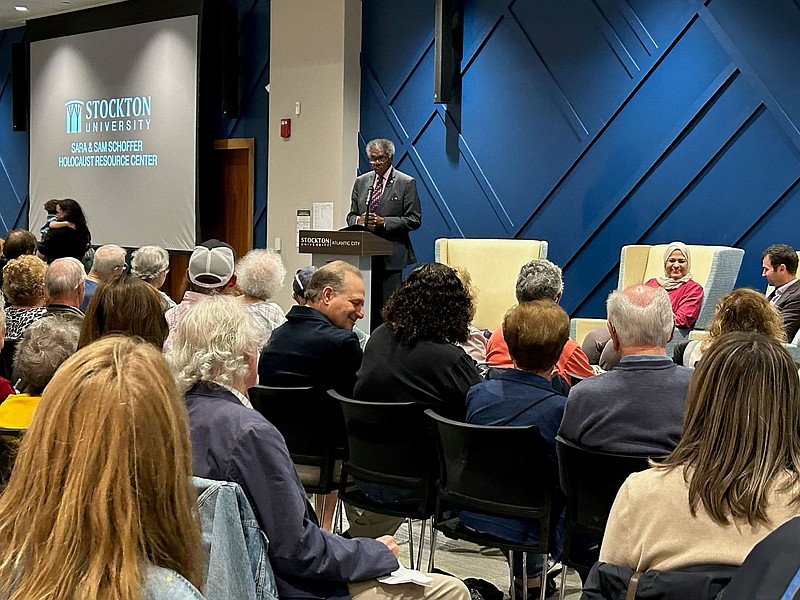 Kaleem Shabazz moderates a program in August.