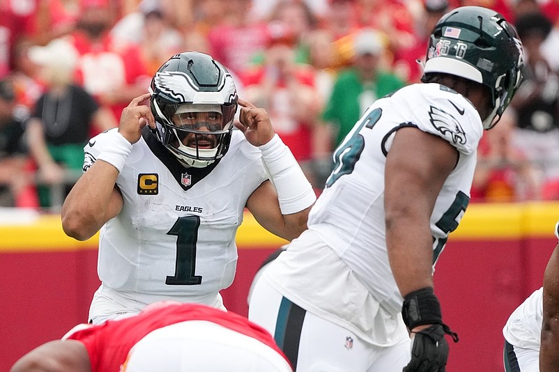 Sep 14, 2025; Kansas City, Missouri, USA; Philadelphia Eagles quarterback Jalen Hurts (1) calls a play line of scrimmage against the Kansas City Chiefs during the second quarter of the game at GEHA Field at Arrowhead Stadium. Mandatory Credit: Denny Medley-Imagn Images
