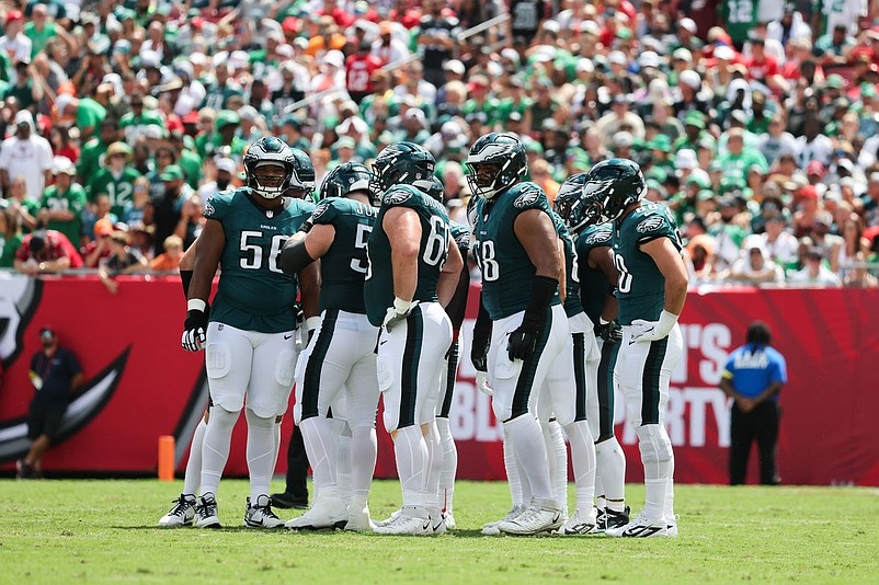 Sep 28, 2025; Tampa, Florida, USA; The Philadelphia Eagles huddle on the field in between plays against the Tampa Bay Buccaneers at Raymond James Stadium. Mandatory Credit: Kim Klement Neitzel-Imagn Images