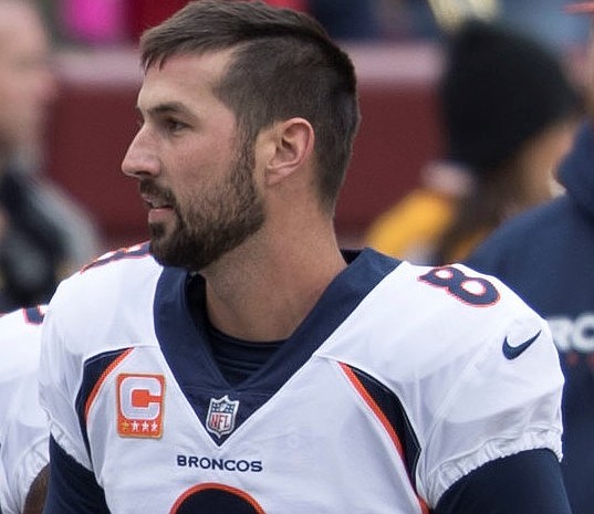 Brandon McManus at with the Broncos at Redskins 12/24/17 (Credit: By Keith Allison from Hanover, MD, USA - Aqib Talib, Brandon McManus, CC BY-SA 2.0, https://commons.wikimedia.org/w/index.php?curid=65031161)