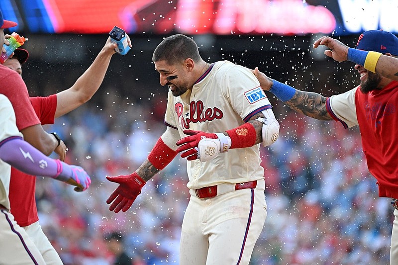 Sep 28, 2025; Philadelphia, Pennsylvania, USA; Philadelphia Phillies outfielder Nick Castellanos (8) celebrate his game-winning sacrifice fly during the tenth inning against the Minnesota Twins at Citizens Bank Park. Mandatory Credit: Eric Hartline-Imagn Images