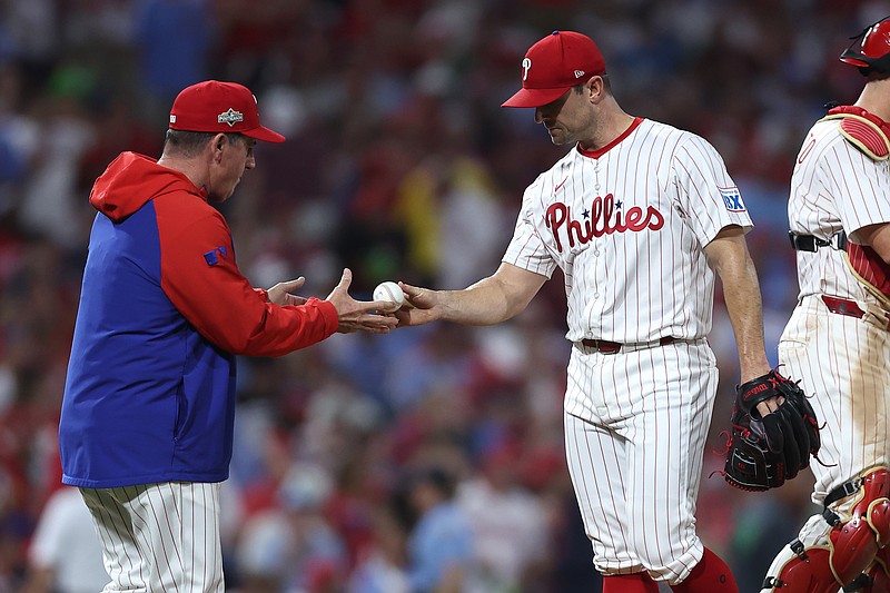 Oct 4, 2025; Philadelphia, Pennsylvania, USA; Philadelphia Phillies manager Rob Thomson (49) relieves pitcher David Robertson (30) in the seventh inning against the Los Angeles Dodgers during game one of the NLDS round for the 2025 MLB playoffs at Citizens Bank Park. Mandatory Credit: Bill Streicher-Imagn Images