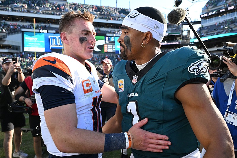 Oct 5, 2025; Philadelphia, Pennsylvania, USA; Denver Broncos quarterback Bo Nix (10) and Philadelphia Eagles quarterback Jalen Hurts (1) meet after the game at Lincoln Financial Field. Mandatory Credit: Eric Hartline-Imagn Images
