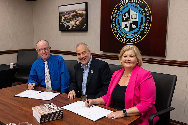 From left, Tom Kinsella, Joe Bertolino and Brigid Callahan Harrison