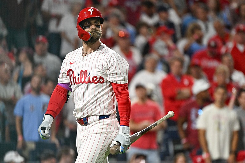 Oct 6, 2025; Philadelphia, Pennsylvania, USA; Philadelphia Phillies first baseman Bryce Harper (3) reacts to striking out against the Los Angeles Dodgers in the sixth inning during game two of the NLDS round for the 2025 MLB playoffs at Citizens Bank Park. Mandatory Credit: Eric Hartline-Imagn Images