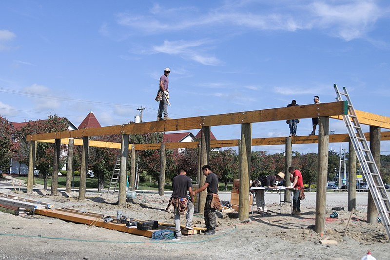 Construction workers are busy building the homes for the Salt House project.