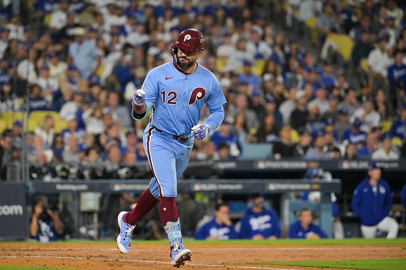 Oct 8, 2025; Los Angeles, California, USA; Philadelphia Phillies designated hitter Kyle Schwarber (12) celebrates after hitting a solo home run during the fourth inning against the Los Angeles Dodgers during game three of the NLDS round for the 2025 MLB playoffs at Dodger Stadium. Mandatory Credit: Jayne Kamin-Oncea-Imagn Images