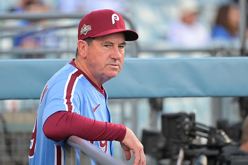 Oct 8, 2025; Los Angeles, California, USA; Philadelphia Phillies manager Rob Thomson (49) looks on before the game against the Los Angeles Dodgers during game three of the NLDS round for the 2025 MLB playoffs at Dodger Stadium. Mandatory Credit: Jayne Kamin-Oncea-Imagn Images