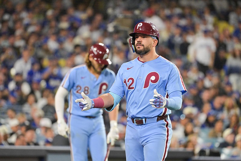 Oct 8, 2025; Los Angeles, California, USA; Philadelphia Phillies designated hitter Kyle Schwarber (12) celebrates after hitting a solo home run during the fourth inning against the Los Angeles Dodgers during game three of the NLDS round for the 2025 MLB playoffs at Dodger Stadium. Mandatory Credit: Jayne Kamin-Oncea-Imagn Images