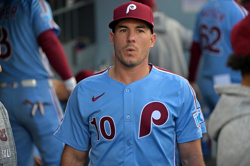 Oct 8, 2025; Los Angeles, California, USA; Philadelphia Phillies catcher J.T. Realmuto (10) in the dugout during game three of the NLDS of the 2025 MLB playoffs against the Los Angeles Dodgers at Dodger Stadium. Mandatory Credit: Jayne Kamin-Oncea-Imagn Images