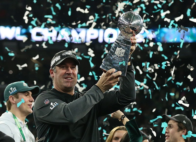 Feb 4, 2018; Minneapolis, MN, USA; Philadelphia Eagles head coach Doug Pederson hoist the Vince Lombardi Trophy after a victory against the New England Patriots in Super Bowl LII at U.S. Bank Stadium. Mandatory Credit: Matthew Emmons-USA TODAY Sports