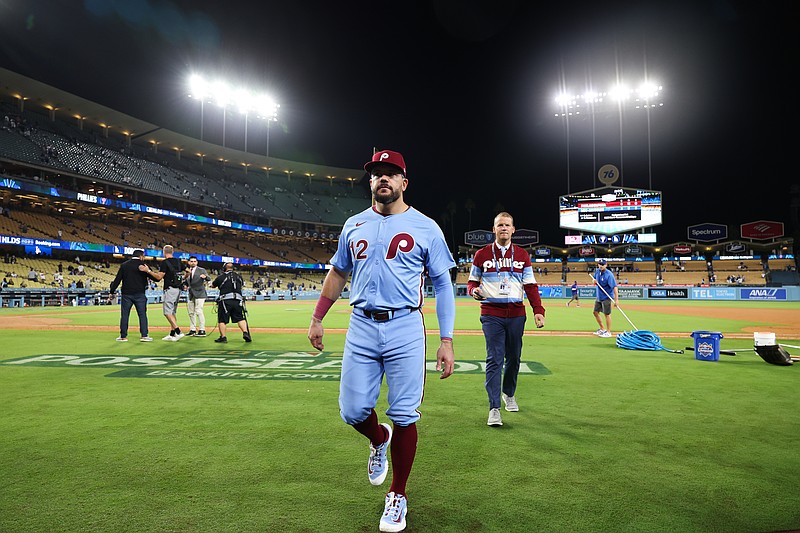 Oct 8, 2025; Los Angeles, California, USA; Philadelphia Phillies designated hitter Kyle Schwarber (12) leaves the field after the game against the Los Angeles Dodgers during game three of the NLDS round for the 2025 MLB playoffs at Dodger Stadium. Mandatory Credit: Kiyoshi Mio-Imagn Images
