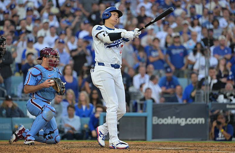 Oct 9, 2025; Los Angeles, California, USA; Los Angeles Dodgers designated hitter Shohei Ohtani (17) bats in the tenth inning against the Philadelphia Phillies during game four of the NLDS round for the 2025 MLB playoffs at Dodger Stadium. Mandatory Credit: Jayne Kamin-Oncea-Imagn Images