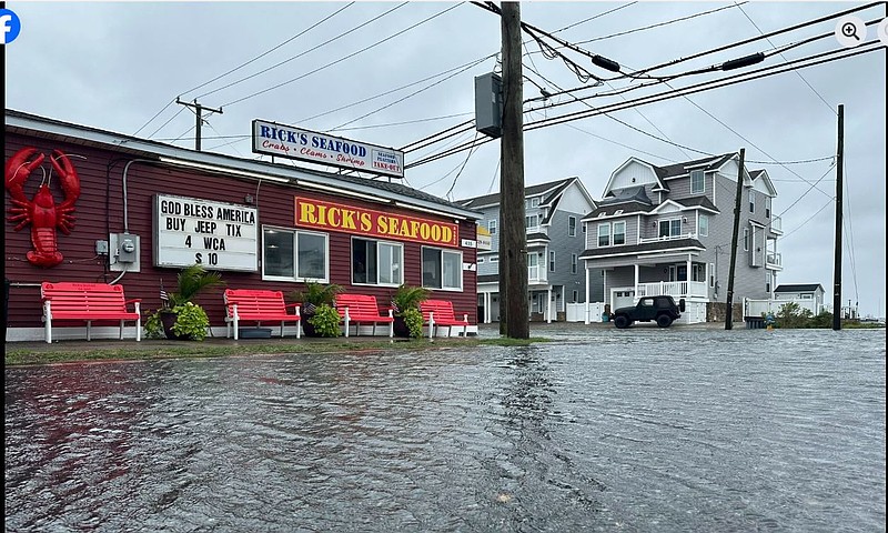 Floodwater swamps West Spruce Avenue in front of Rick's Seafood in North Wildwood.