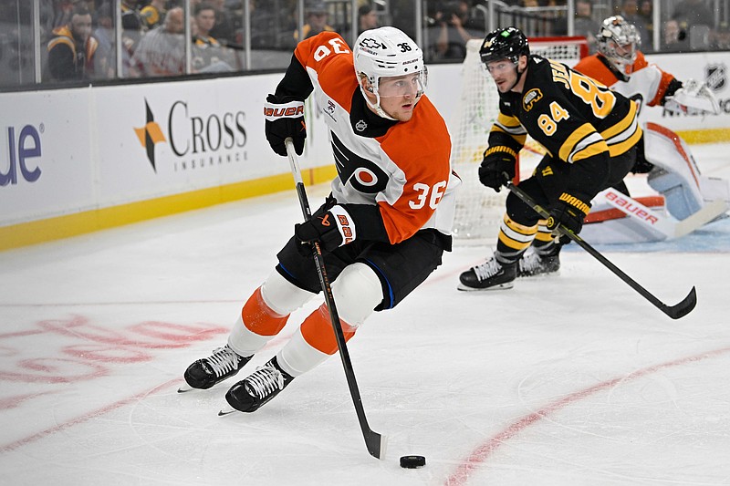 Sep 29, 2025; Boston, Massachusetts, USA;  Philadelphia Flyers defenseman Emil Andrae (36) controls the puck against the Boston Bruins during the first period at TD Garden. Mandatory Credit: Eric Canha-Imagn Images