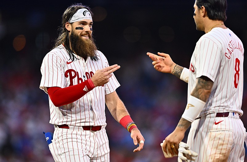 Apr 20, 2024; Philadelphia, Pennsylvania, USA; Philadelphia Phillies outfielder Brandon Marsh (16) reacts with outfielder Nick Castellanos (8) against the Chicago White Sox in the fifth inning at Citizens Bank Park. Mandatory Credit: Kyle Ross-USA TODAY Sports