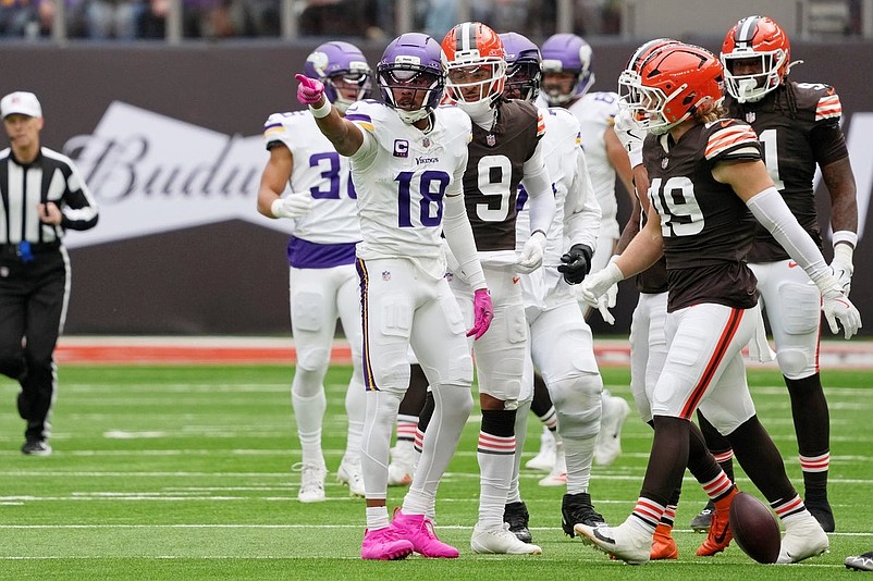 Oct 5, 2025; Tottenham, United Kingdom; Minnesota Vikings wide receiver Justin Jefferson (18) reacts after a play against the Cleveland Browns during the first quarter of an NFL International Series game at Tottenham Hotspur Stadium. Mandatory Credit: Kirby Lee-Imagn Images