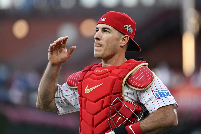 Oct 6, 2025; Philadelphia, Pennsylvania, USA; Philadelphia Phillies catcher J.T. Realmuto (10) walks to the dugout prior to game two of the NLDS round against the Los Angeles Dodgers for the 2025 MLB playoffs at Citizens Bank Park. Mandatory Credit: Eric Hartline-Imagn Images