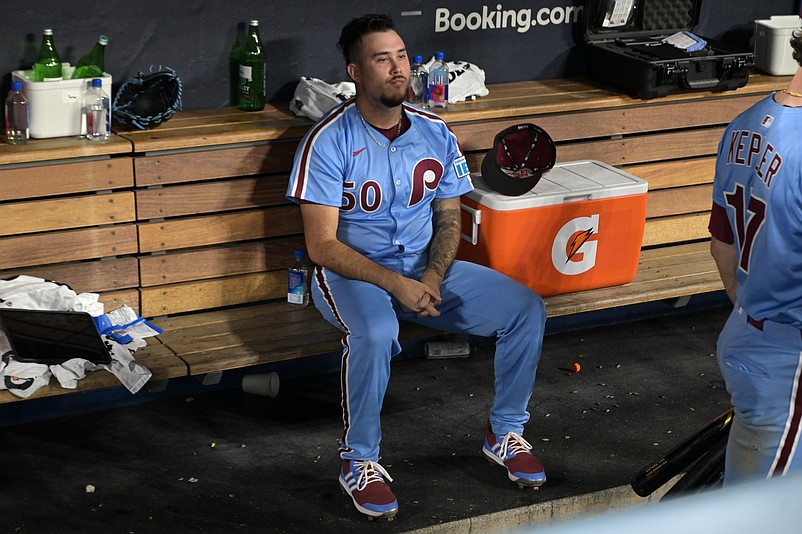 Oct 9, 2025; Los Angeles, California, USA; Philadelphia Phillies pitcher Orion Kerkering (50) in the dugout after the final out as they lost to the Los Angeles Dodgers in game four of the NLDS during the 2025 MLB playoffs at Dodger Stadium. Mandatory Credit: Jayne Kamin-Oncea-Imagn Images