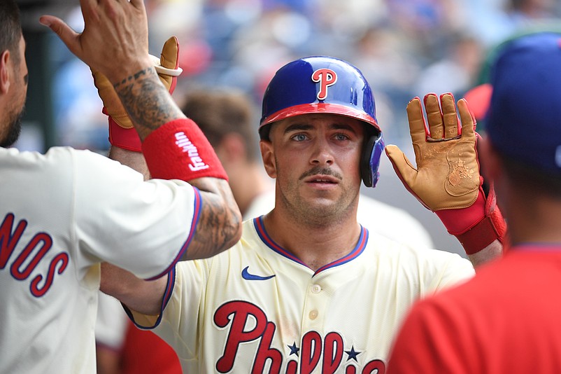 Jul 20, 2025; Philadelphia, Pennsylvania, USA; Philadelphia Phillies first base Otto Kemp (4) in the dugout after hitting a  home run during the sixth inning against the Los Angeles Angels at Citizens Bank Park. Mandatory Credit: Eric Hartline-Imagn Images