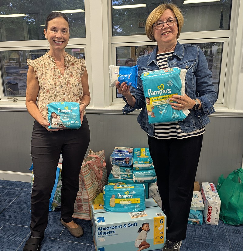 PROVIDED/Nicola Tasoff, community partnerships chairperson, American Assn. of University Women Atlantic City, presents 105 pounds of diapers, wipes and creams to Women Fighting Hunger Chair Kathy Corbalis at the AAUW’s Sept. 25, 2025 meeting.