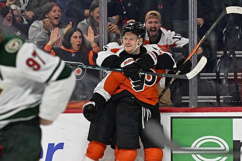 Oct 18, 2025; Philadelphia, Pennsylvania, USA; Philadelphia Flyers right wing Owen Tippett (74) celebrates his goal with center Trevor Zegras (46) against the Minnesota Wild during the third period at Wells Fargo Center. Mandatory Credit: Eric Hartline-Imagn Images