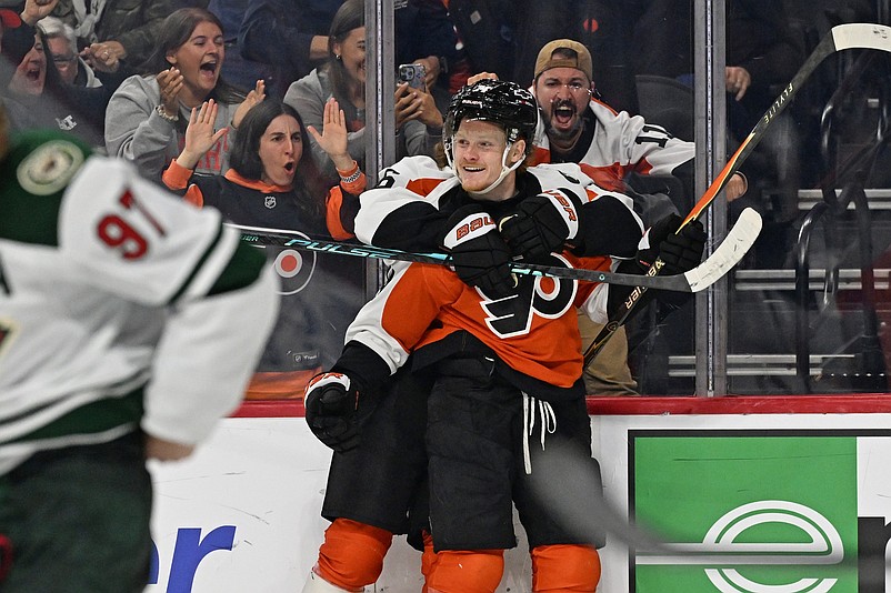 Oct 18, 2025; Philadelphia, Pennsylvania, USA; Philadelphia Flyers right wing Owen Tippett (74) celebrates his goal with center Trevor Zegras (46) against the Minnesota Wild during the third period at Wells Fargo Center. Mandatory Credit: Eric Hartline-Imagn Images