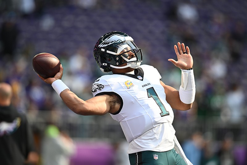 Oct 19, 2025; Minneapolis, Minnesota, USA; Philadelphia Eagles quarterback Jalen Hurts (1) warms up before the game against the Minnesota Vikings at U.S. Bank Stadium. Mandatory Credit: Jeffrey Becker-Imagn Images