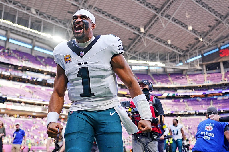 Oct 19, 2025; Minneapolis, Minnesota, USA; Philadelphia Eagles quarterback Jalen Hurts (1) waves to the fans after the game against the Minnesota Vikings at U.S. Bank Stadium. Mandatory Credit: Brad Rempel-Imagn Images