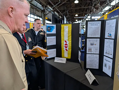 Marine Corps Major General Ryan S. Rideout, Commanding General of the U.S. Marine Corps’ 2nd Marine Aircraft Wing, and other top military leaders look at the real-world potential of Pennridge students’ innovative prototypes. (Courtesy of David Thomas)