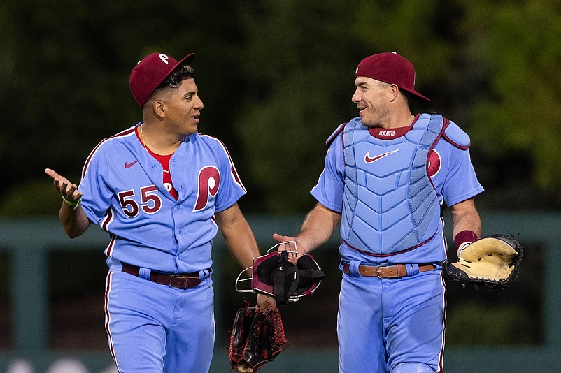 Sep 21, 2023; Philadelphia, Pennsylvania, USA; Philadelphia Phillies starting pitcher Ranger Suarez (55) and catcher J.T. Realmuto (10) talk as they take the field for action against the New York Mets at Citizens Bank Park. Mandatory Credit: Bill Streicher-USA TODAY Sports