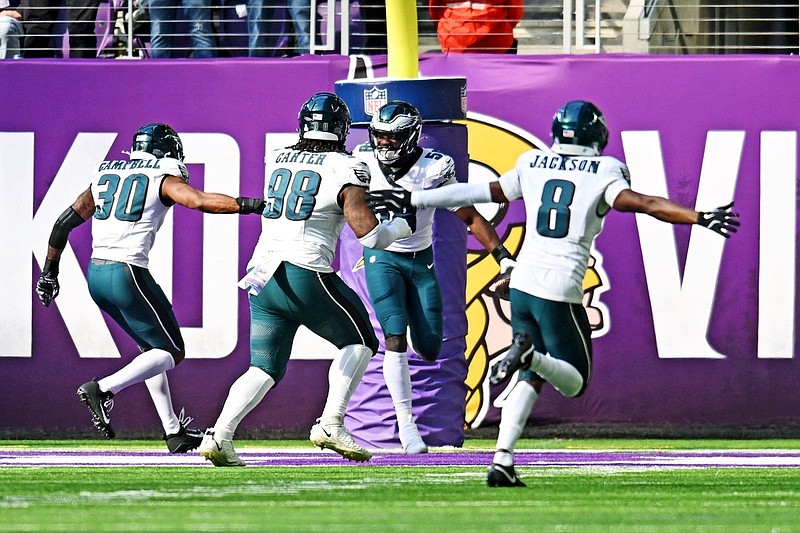 Oct 19, 2025; Minneapolis, Minnesota, USA; Philadelphia Eagles linebacker Jalyx Hunt (58) reacts with teammates after a play during the second half against the Minnesota Vikings at U.S. Bank Stadium. Mandatory Credit: Jeffrey Becker-Imagn Images