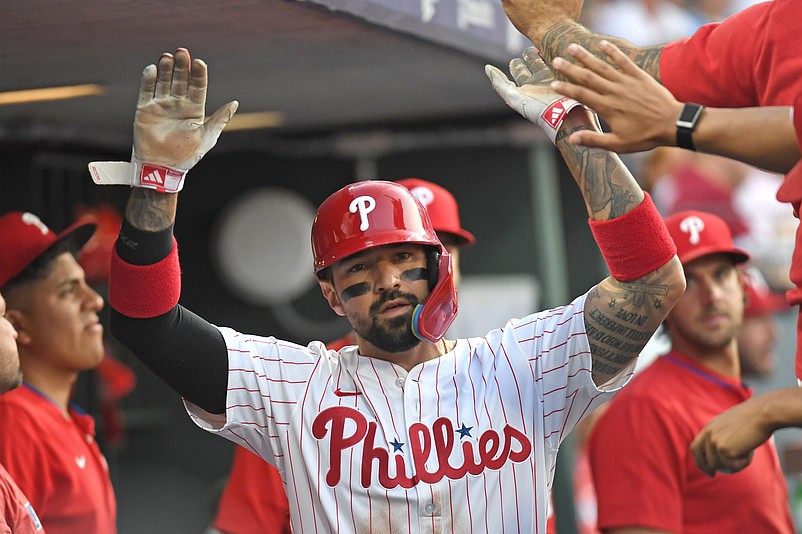 Jul 21, 2025; Philadelphia, Pennsylvania, USA; Philadelphia Phillies outfielder Nick Castellanos (8) celebrates in the dugout after scoring a run during the fourth inning against the Boston Red Sox at Citizens Bank Park. Mandatory Credit: Eric Hartline-Imagn Images