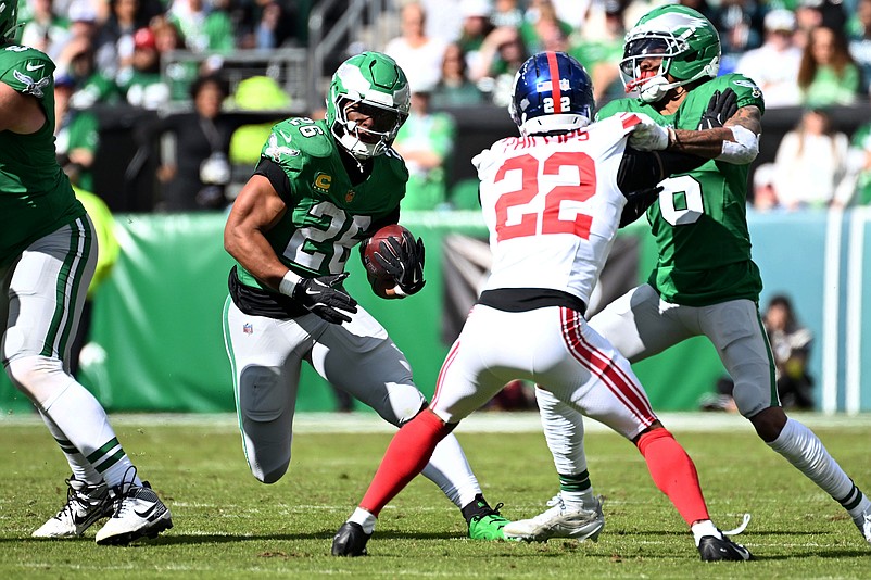 Oct 26, 2025; Philadelphia, Pennsylvania, USA; Philadelphia Eagles running back Saquon Barkley (26) runs against the New York Giants in the first quarter at Lincoln Financial Field. Mandatory Credit: Eric Hartline-Imagn Images