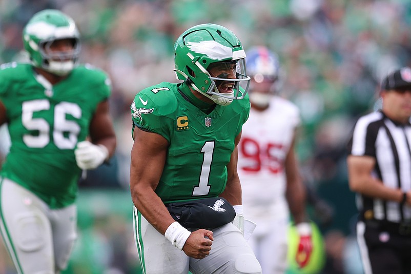 Oct 26, 2025; Philadelphia, Pennsylvania, USA; Philadelphia Eagles quarterback Jalen Hurts (1) reacts after  his touchdown pass against the New York Giants during the fourth quarter at Lincoln Financial Field. Mandatory Credit: Bill Streicher-Imagn Images