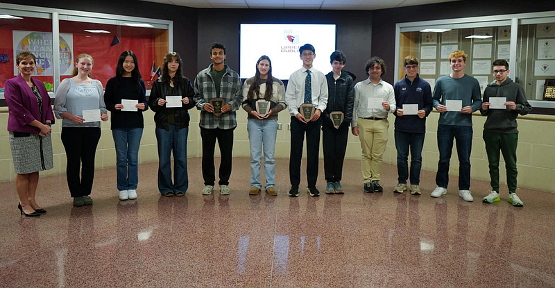 Upper Dublin National Merit honorees and Superintendent Dr. Laurie Smith following their recognition at the Upper Dublin Board of School Directors meeting. Credit: Upper Dublin School District.