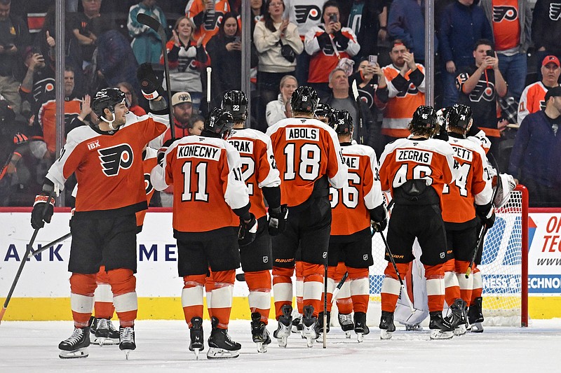 Oct 30, 2025; Philadelphia, Pennsylvania, USA;  Philadelphia Flyers celebrate win against the Nashville Predators at Xfinity Mobile Arena. Mandatory Credit: Eric Hartline-Imagn Images