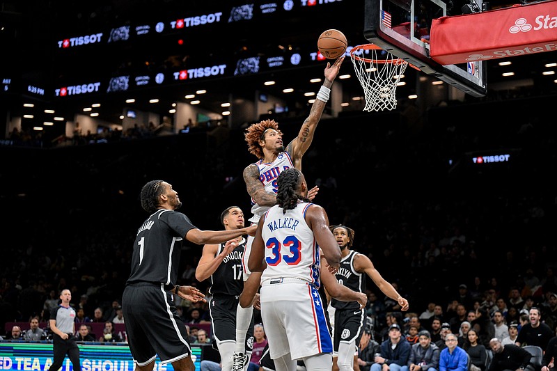 Nov 2, 2025; Brooklyn, New York, USA; Philadelphia 76ers guard Kelly Oubre Jr. (9) drives to the basket against the Brooklyn Nets during the first half at Barclays Center. Mandatory Credit: John Jones-Imagn Images