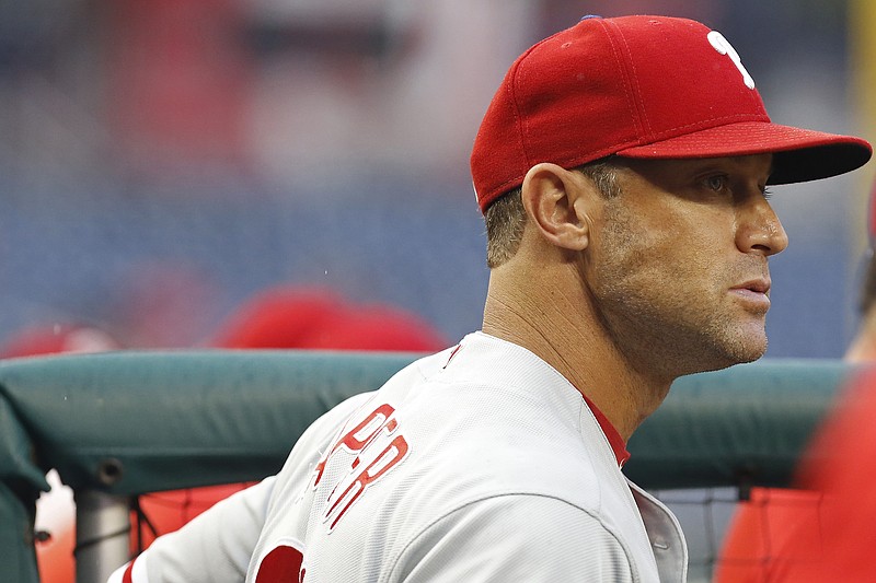 Aug 21, 2018; Washington, DC, USA; Philadelphia Phillies manager Gabe Kapler (22) looks on from the dugout against the Washington Nationals in the first inning at Nationals Park. Mandatory Credit: Geoff Burke-USA TODAY Sports