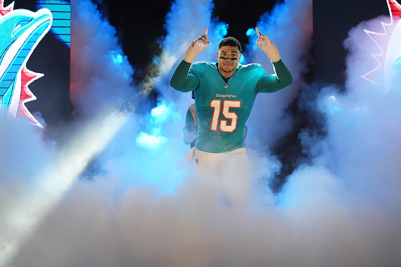 Sep 30, 2024; Miami Gardens, Florida, USA; Miami Dolphins linebacker Jaelan Phillips (15) takes the field prior to the game against the Tennessee Titans at Hard Rock Stadium. Mandatory Credit: Jasen Vinlove-Imagn Images