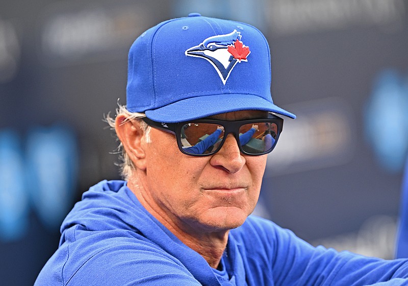 Apr 3, 2023; Kansas City, Missouri, USA;  Toronto Blue Jays bench coach Don Mattingly (23) looks on during batting practice, prior to a game against the Kansas City Royals at Kauffman Stadium. Mandatory Credit: Peter Aiken-USA TODAY Sports