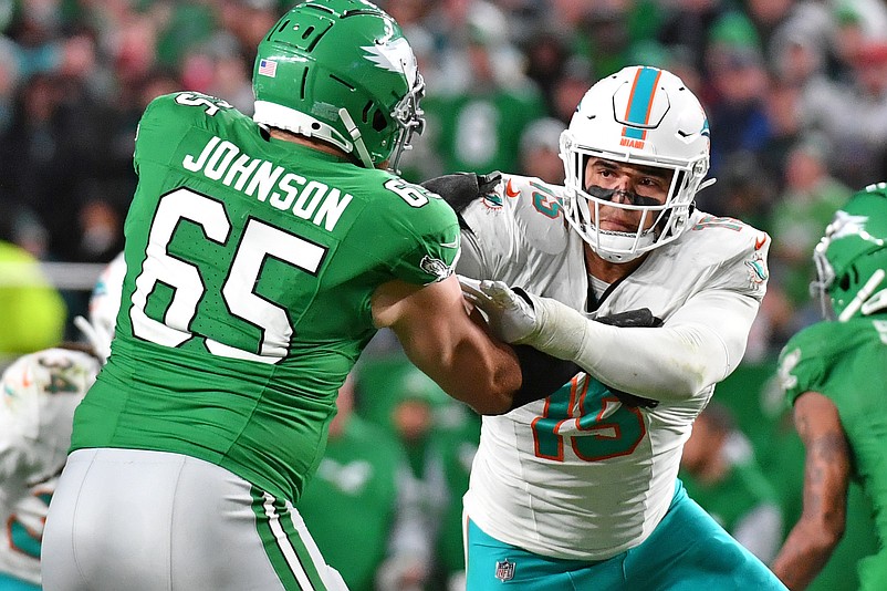 Oct 22, 2023; Philadelphia, Pennsylvania, USA; Philadelphia Eagles offensive tackle Lane Johnson (65) blocks Miami Dolphins linebacker Jaelan Phillips (15) at Lincoln Financial Field. Mandatory Credit: Eric Hartline-USA TODAY Sports