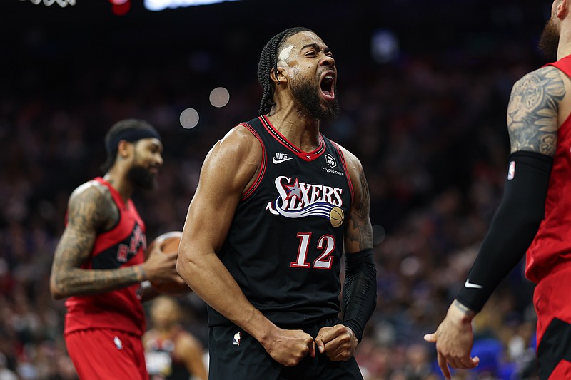 Nov 8, 2025; Philadelphia, Pennsylvania, USA; Philadelphia 76ers forward Trendon Watford (12) reacts after a score and foul against the Toronto Raptors during the first quarter at Xfinity Mobile Arena. Mandatory Credit: Bill Streicher-Imagn Images
