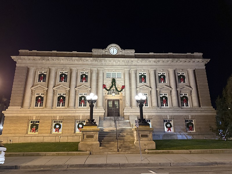 City Hall is adorned with holiday wreaths hanging from each window. (Photos by Max Kelly)