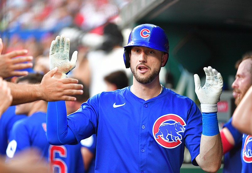 Jun 25, 2025; St. Louis, Missouri, USA; Chicago Cubs outfielder Kyle Tucker (30) celebrates his home run against the St. Louis Cardinals in the third inning at Busch Stadium with teammates in the dugout. Mandatory Credit: Tim Vizer-Imagn Images