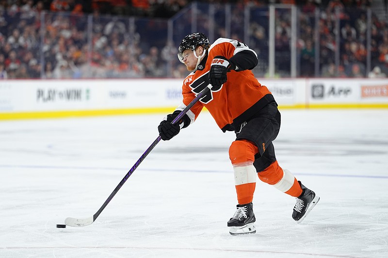 Nov 8, 2025; Philadelphia, Pennsylvania, USA; Philadelphia Flyers right wing Owen Tippett (74) shoots the puck against the Ottawa Senators in the second period at Xfinity Mobile Arena. Mandatory Credit: Kyle Ross-Imagn Images