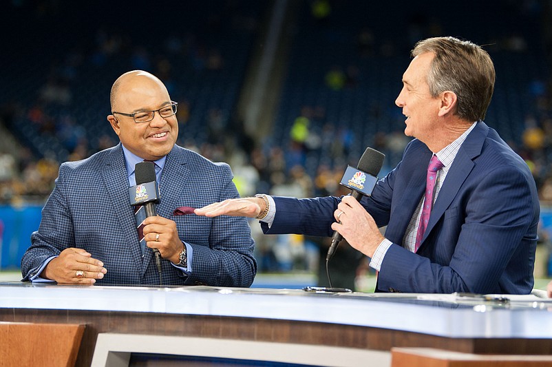 Oct 29, 2017; Detroit, MI, USA; NBC Sports broadcasters Mike Tirico and Cris Collinsworth speak before a game between the Detroit Lions and the Pittsburgh Steelers at Ford Field. Mandatory Credit: Tim Fuller-USA TODAY Sports