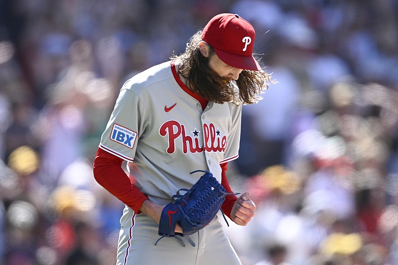 Jul 13, 2025; San Diego, California, USA; Philadelphia Phillies relief pitcher Matt Strahm (25) reacts after the Phillies defeated the San Diego Padres at Petco Park. Mandatory Credit: Denis Poroy-Imagn Images